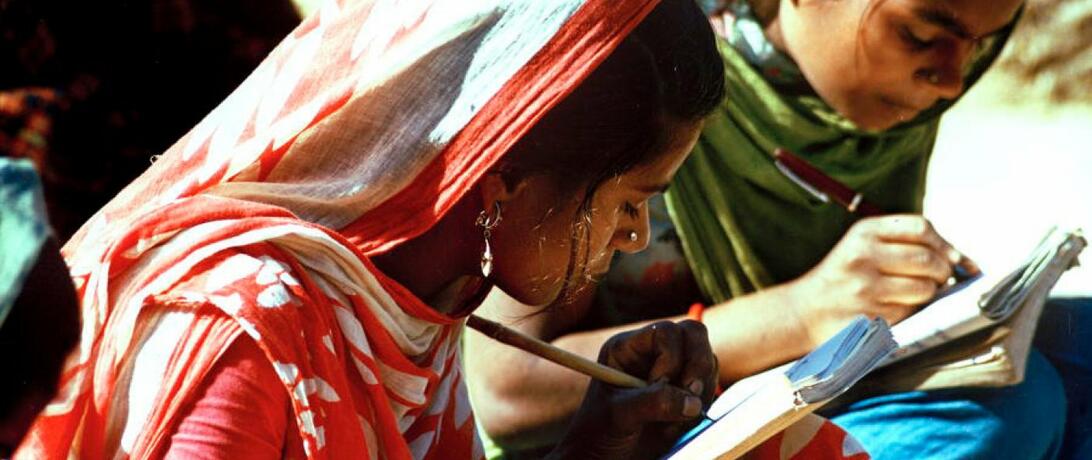 young girl writing